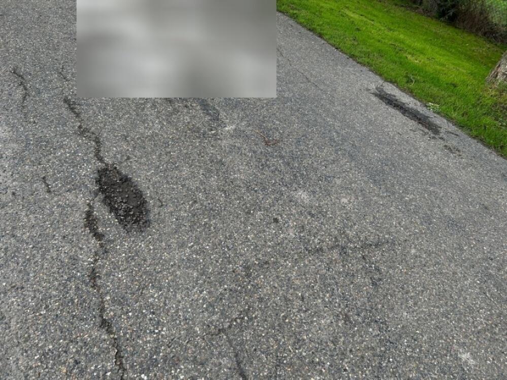 Foto bij melding 5586796 · Wegen, fietspaden, en stoepen